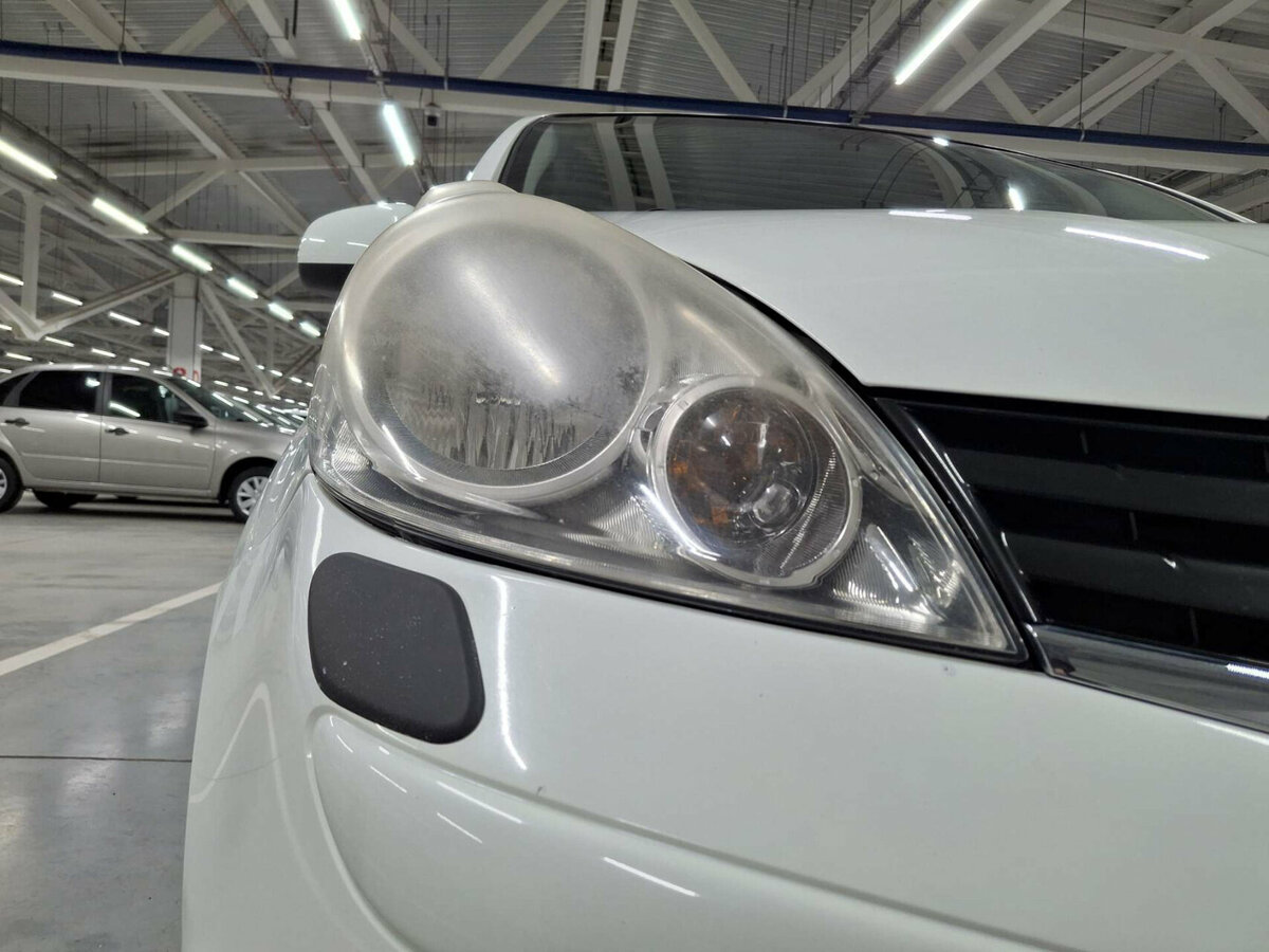 Nissan Note I Рестайлинг, 2012 Фото №17